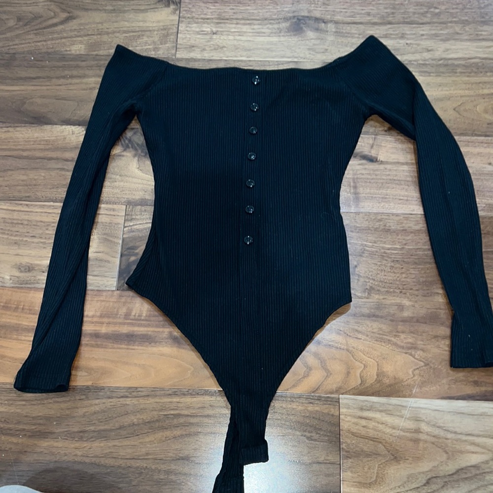 About Us - Revolve brand XS off shoulder black bodysuit